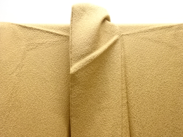  のり散らし模様織り出し一つ紋色無地着物